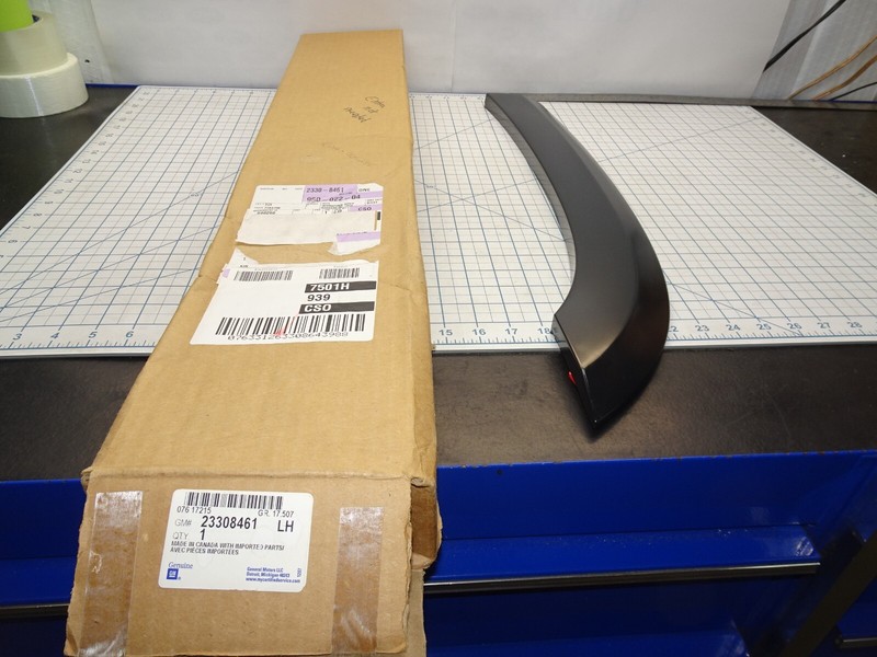 GM 23308461 Molding Rear Fender Flare LH Primed You Paint General Motors OEM