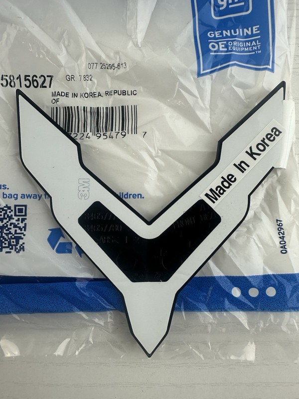 New OEM 2020-2026 Chevrolet Corvette X-Flag Front Carbon Flash Metallic Emblem gallery