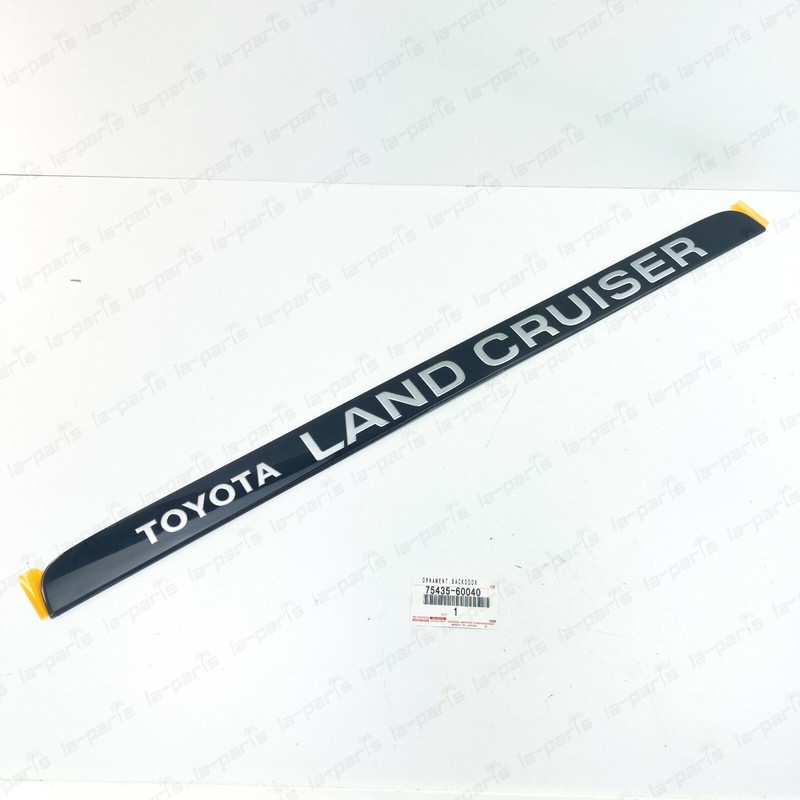 NEW GENUINE TOYOTA 91-97 LAND CRUISER FJ80 FZJ8 REAR LIFTGATE ORNAMENT